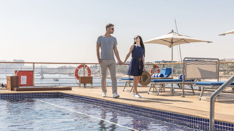 A couple on the deck of Oberoi Zahra