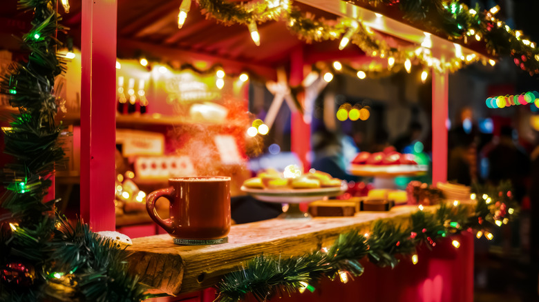 Steaming hot cocoa at a Christmas market stall