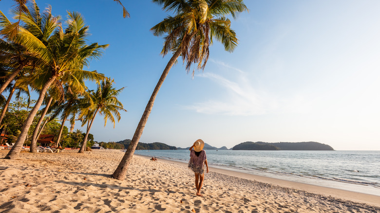 A woman on a beach in Langkawi, Malaysia.