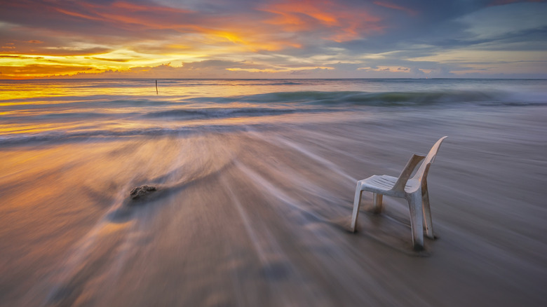 An abandoned chair at sunset on Pulau Labuan.