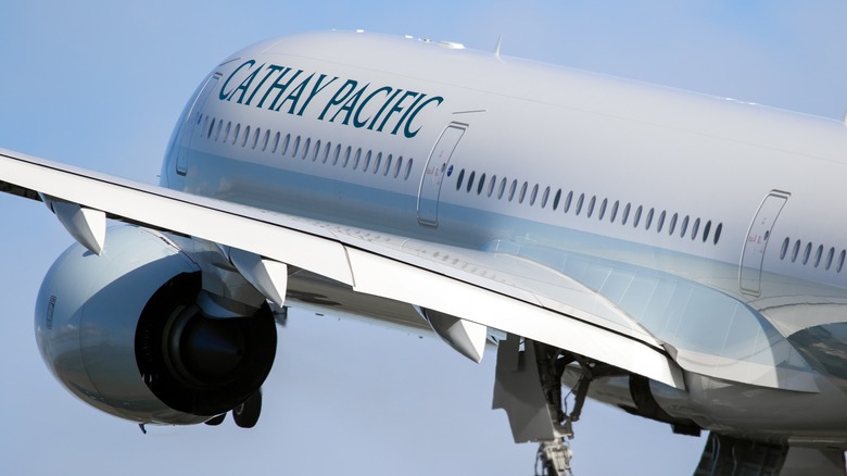 A Cathay Pacific Airbus A350 passenger plane taking off from Schiphol International Airport