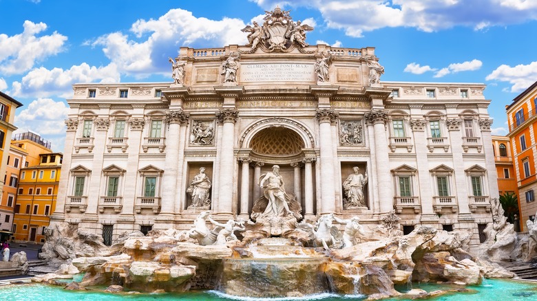 Trevi Fountain against blue sky and clouds