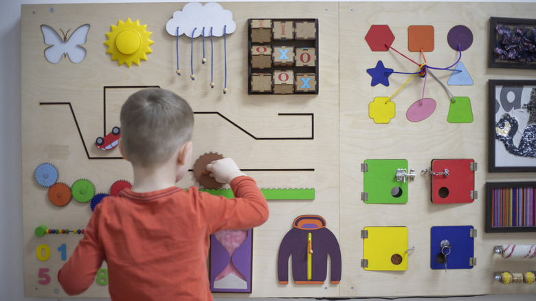 Little boy playing in a sensory-friendly space