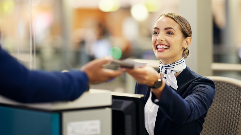 Airport employee receiving documents