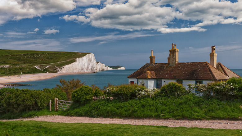 A house by cliffside ocean