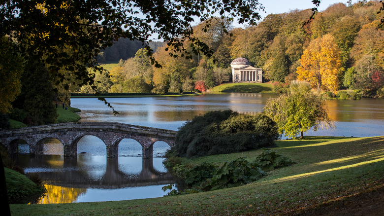 A bridge, lake, and temple