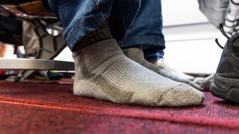 Feet on airplane floor