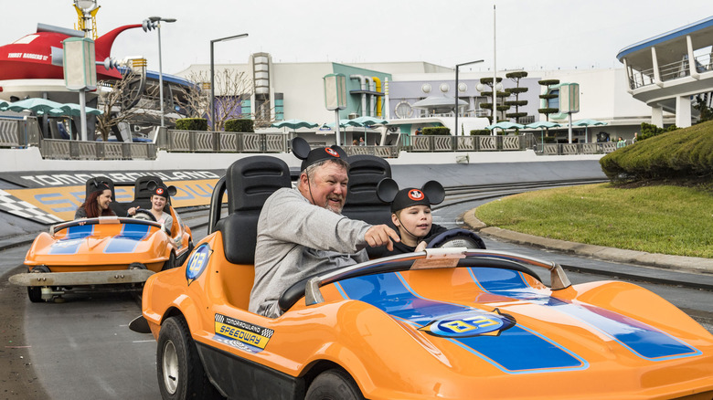 Guests on Tomorrowland Speedway