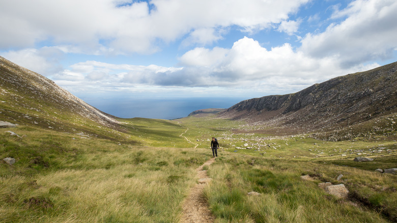 Man hiking alone in Isle of Arran