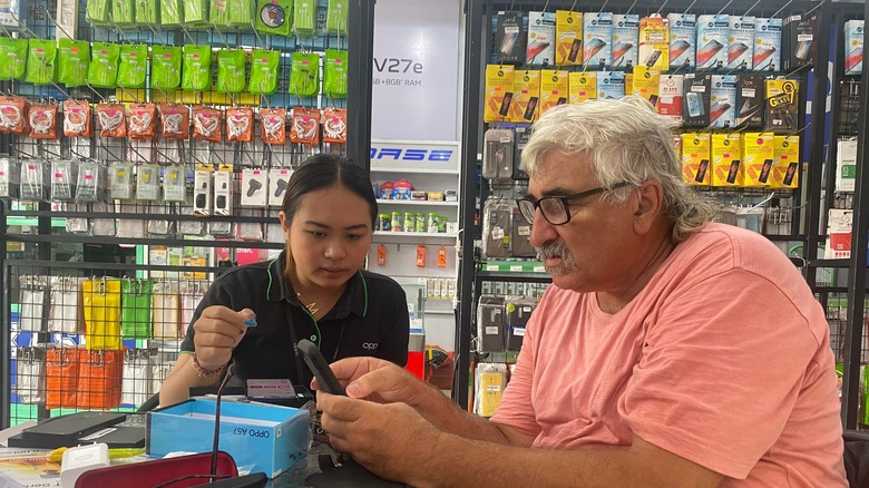 Tourists buying Bali SIM card