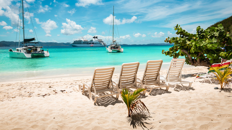 chairs, boats at White Bay Beach