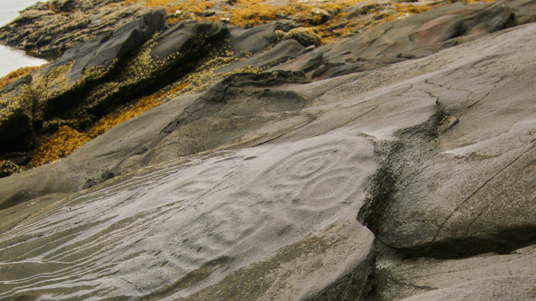 Petroglyph Beach State Historic Park carvings on the coastline