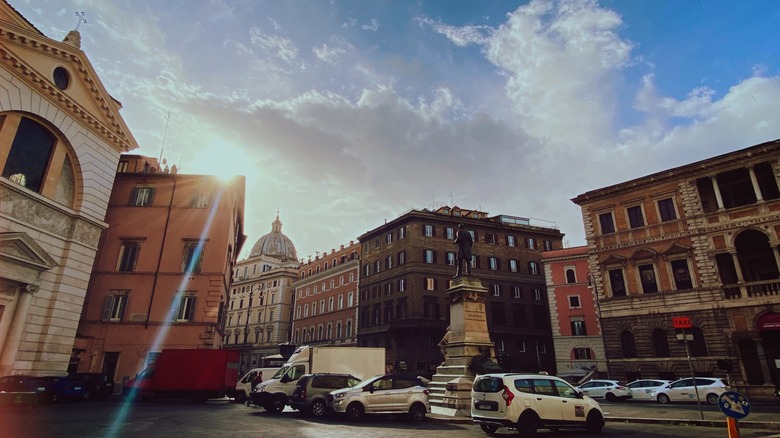 Cars parked around Parione near Rome