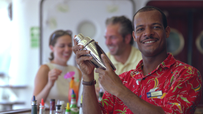 Cruise ship bartender shaking drinks