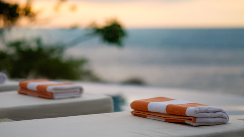 Orange and white stripe towels at a luxury resort