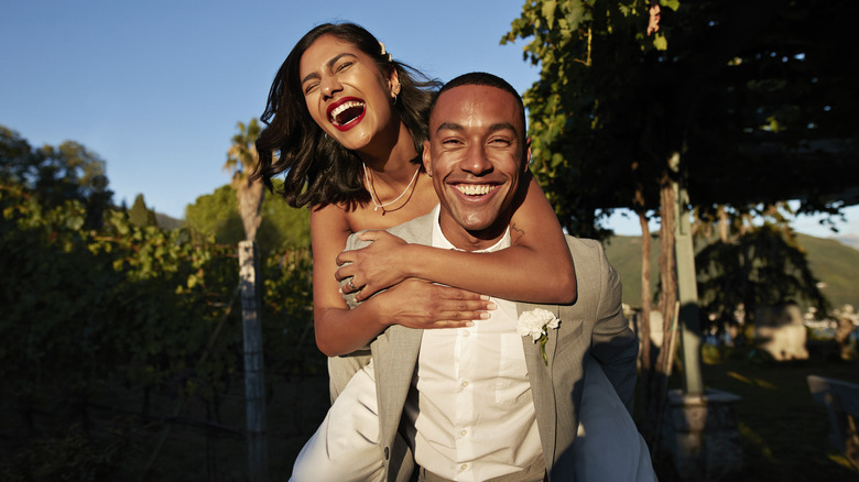 Smiling bride and groom