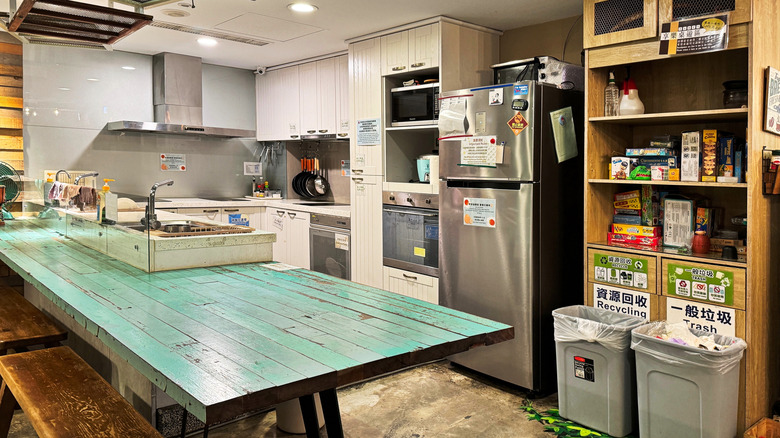 The small communal kitchen of a Taiwanese hostel