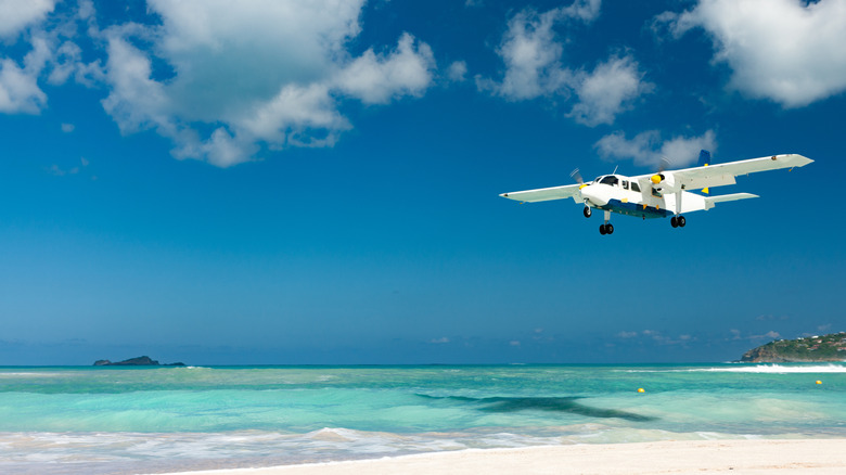 Plane landing near St. Jeans Beach in St. Barts