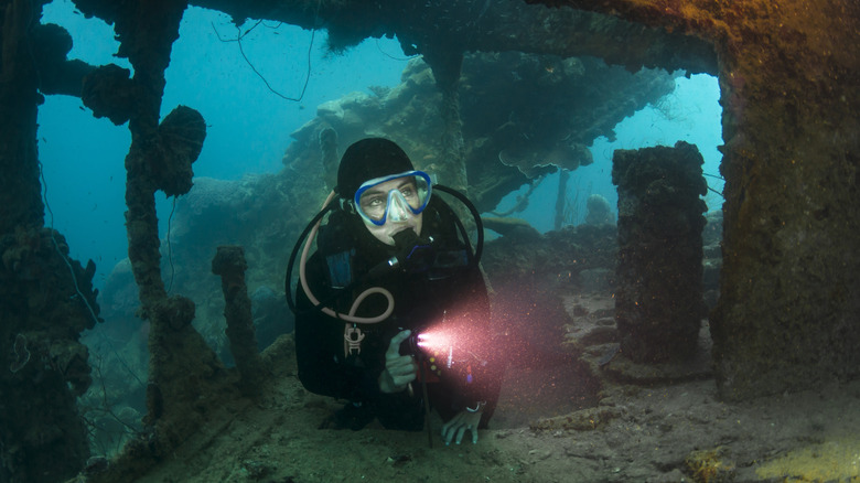 Scuba diver in a shipwreck