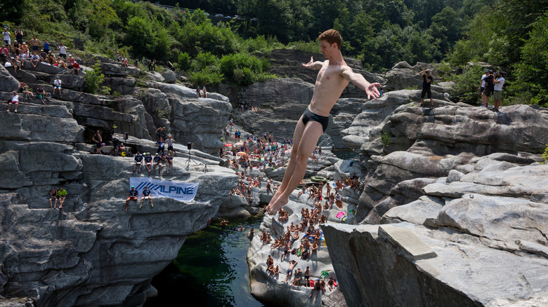 Cliff diver in Ponte Brolla, close to Brontallo, Switzerland