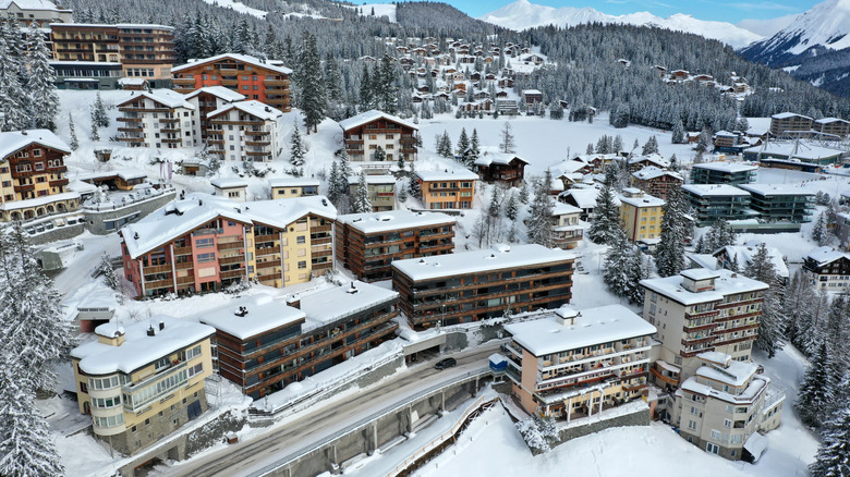 Holiday apartments and hotels after several days snowing in Arosa, Switzerland