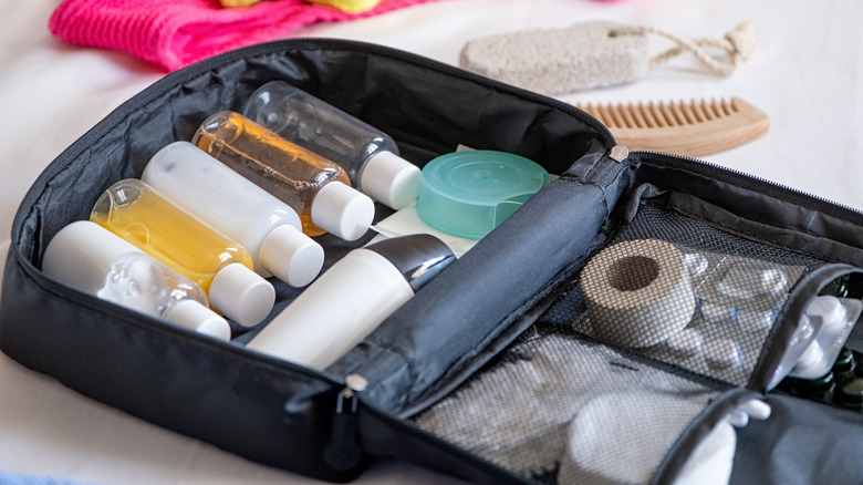 Skincare items inside a travel bag