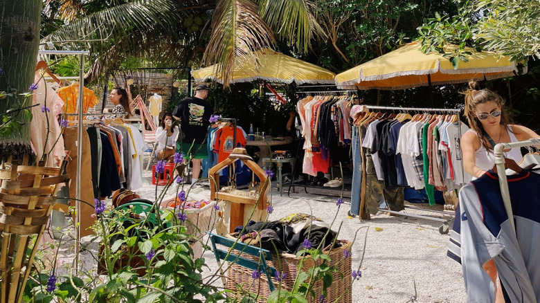 Vintage market stalls surrounded by tropical palms