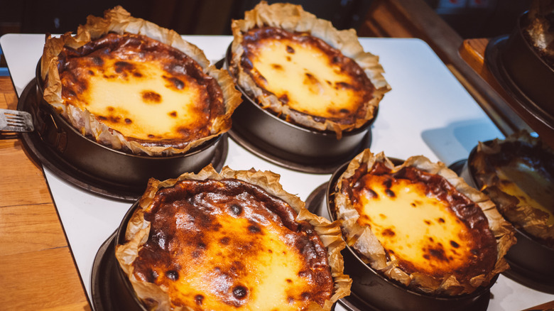 Burnt Basque cheesecakes laid out on a counter