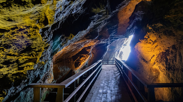 Wooden boardwalk through sea cave