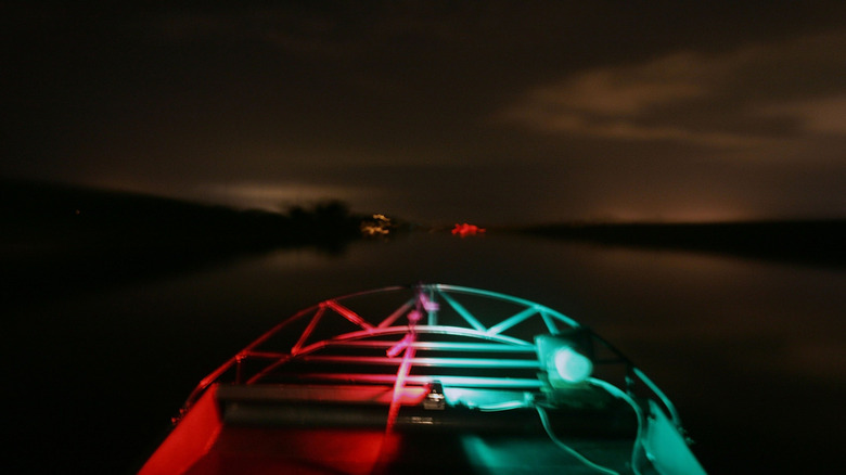 Boat on lake during alligator hunting season in Belle Glade