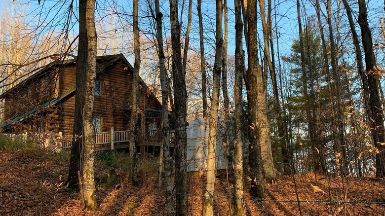 Milkweed Inn in Michigan among trees in autumn