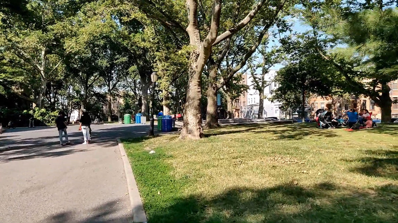 Sunset Park walkway with people enjoying the park