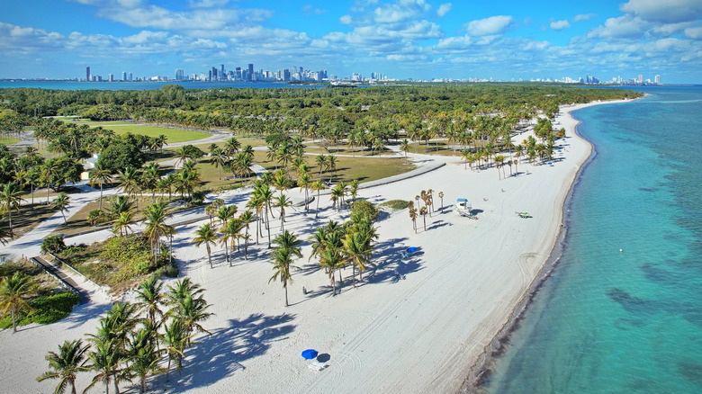 Aerial view of Crandon Beach on Key Biscayne with Miami skyline in distance