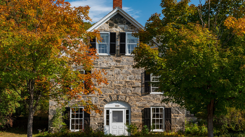 A house between trees in Chester's Stone Village Historic District