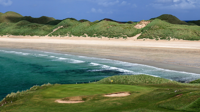 Durness Golf Club in Scotland green overlooking water