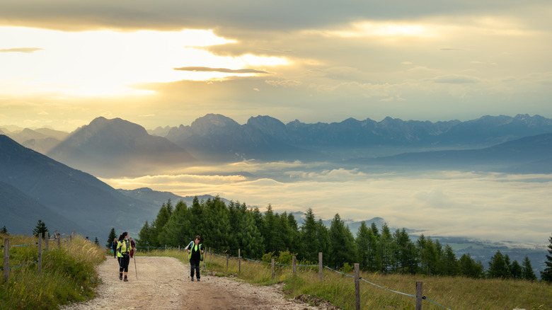 Hikers on route in Pedavena, Italy