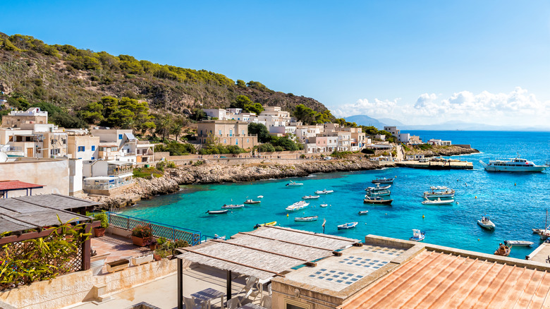 View of the bay with boats from Levanzo island in Italy