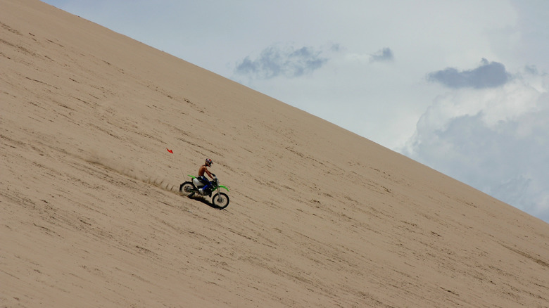 Dirt biker on the dunes of Little Sahara State Park