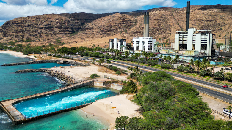 Aerial view over Electric Beach with the power plant in background