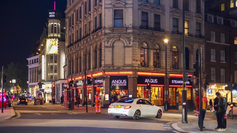 Exterior of Angus Steakhouse at night in London