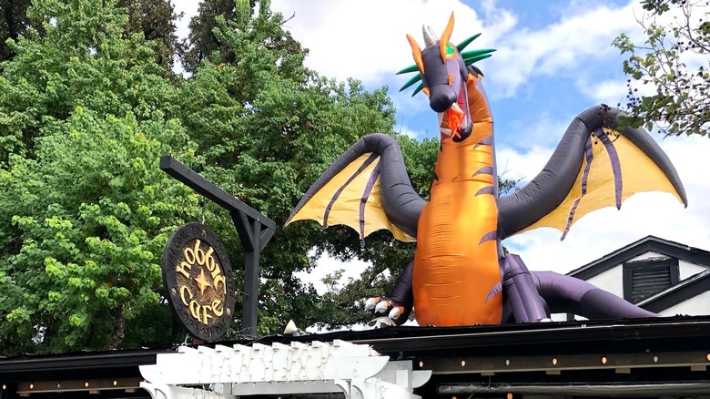 The inflatable dragon above the Hobbit Cafe