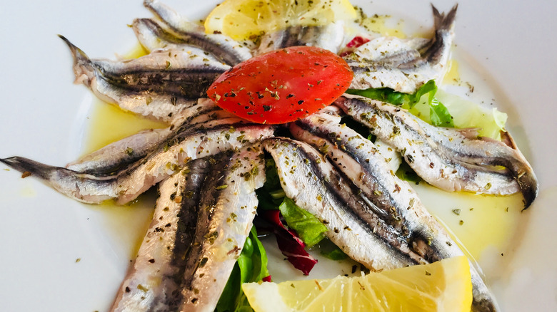 Anchovy dish with lemon, a typical snack in Manarola, Italy