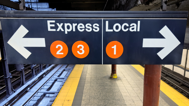 Sign showing express and local trains