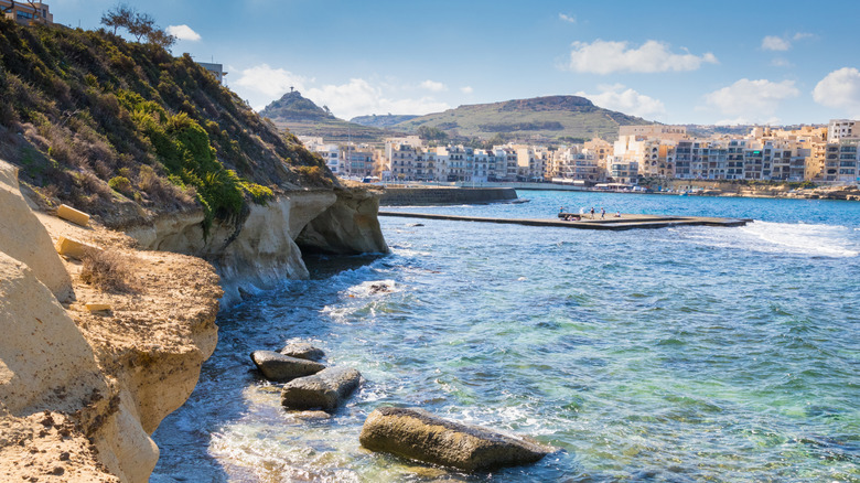 View of buildings and the waters off Marsalforn Bay, Gozo, Malta