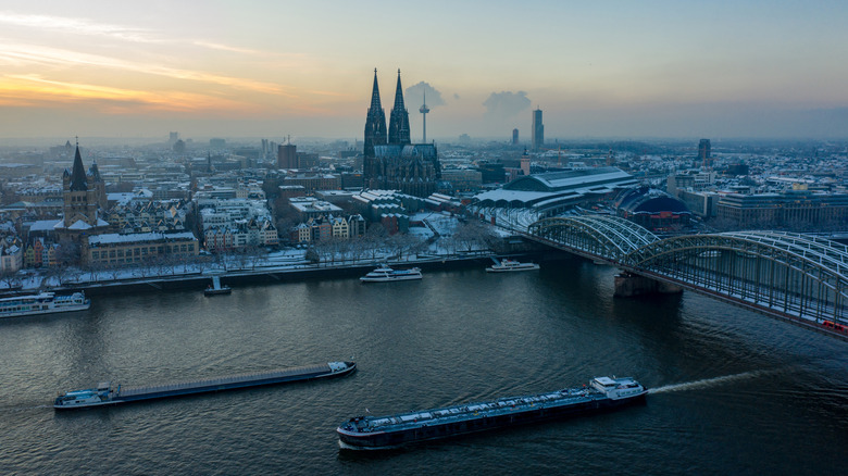 Aerial view of Cologne and the Rhine River with snowy rooftops