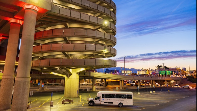 Circular parking structure and shuttle with Las Vegas Strip in the background