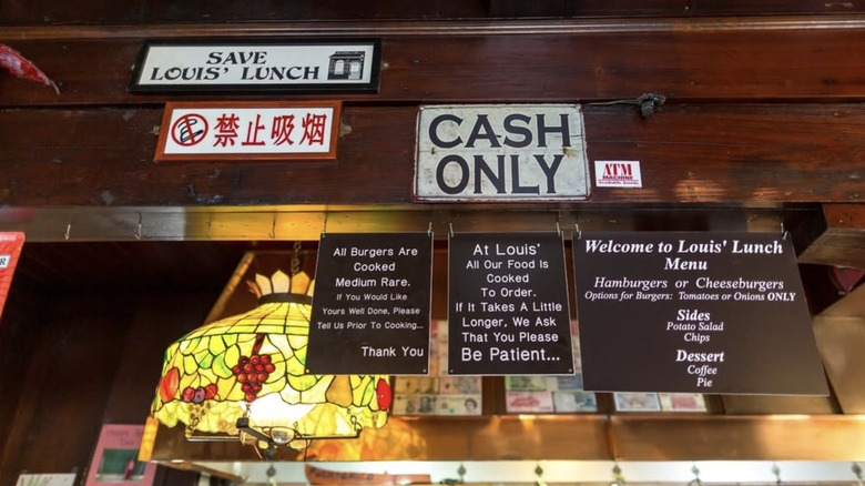 Cash Only sign and menu at Louis' Lunch in New Haven, CT