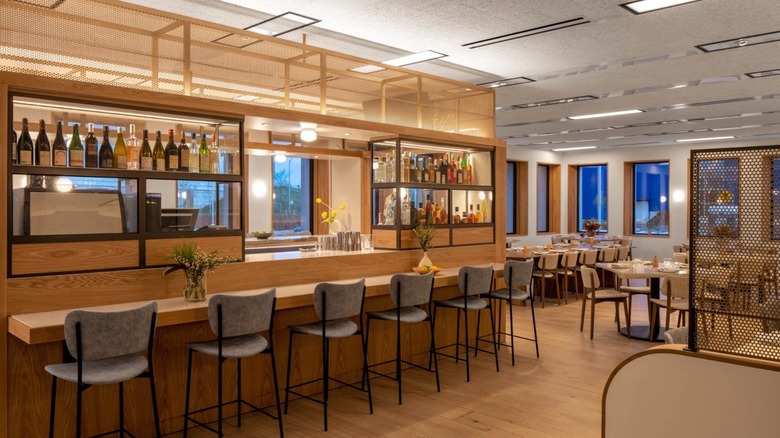 Interior image of BLDG, the on-site restaurant at Hotel Marcel in New Haven, Connecticut, in the evening