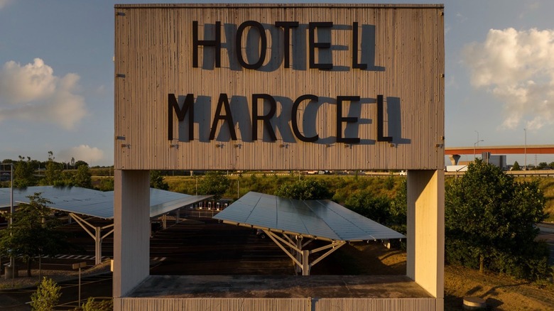 View of Hotel Marcel's sign and the many solar panels that power this sustainable property in New Haven, Connecticut