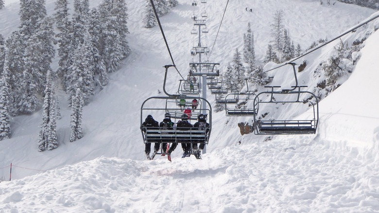 People on a chair lift on Powder Mountain.